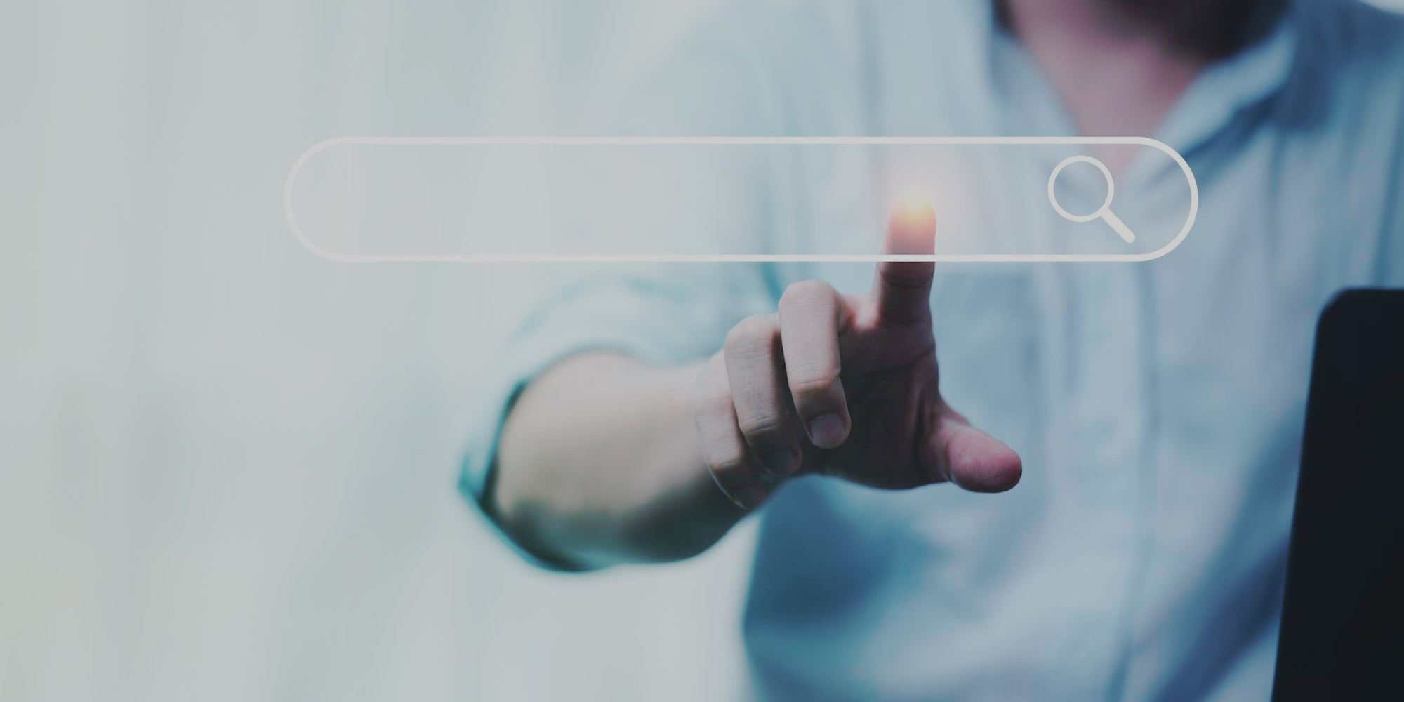 decorative image of finger touching web search bar